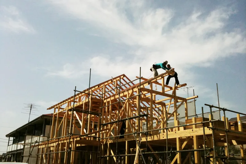 Framing carpenters working on a house under construction
