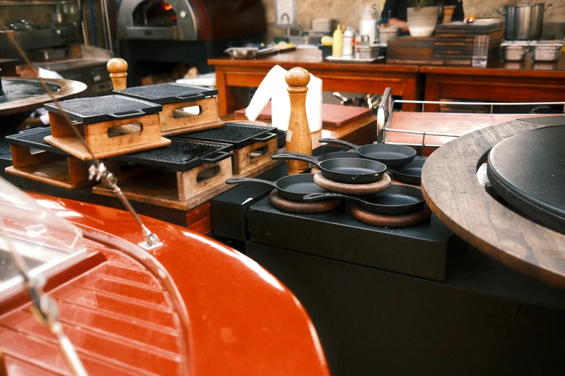 The grill line and cooking equipment of a working restaurant kitchen